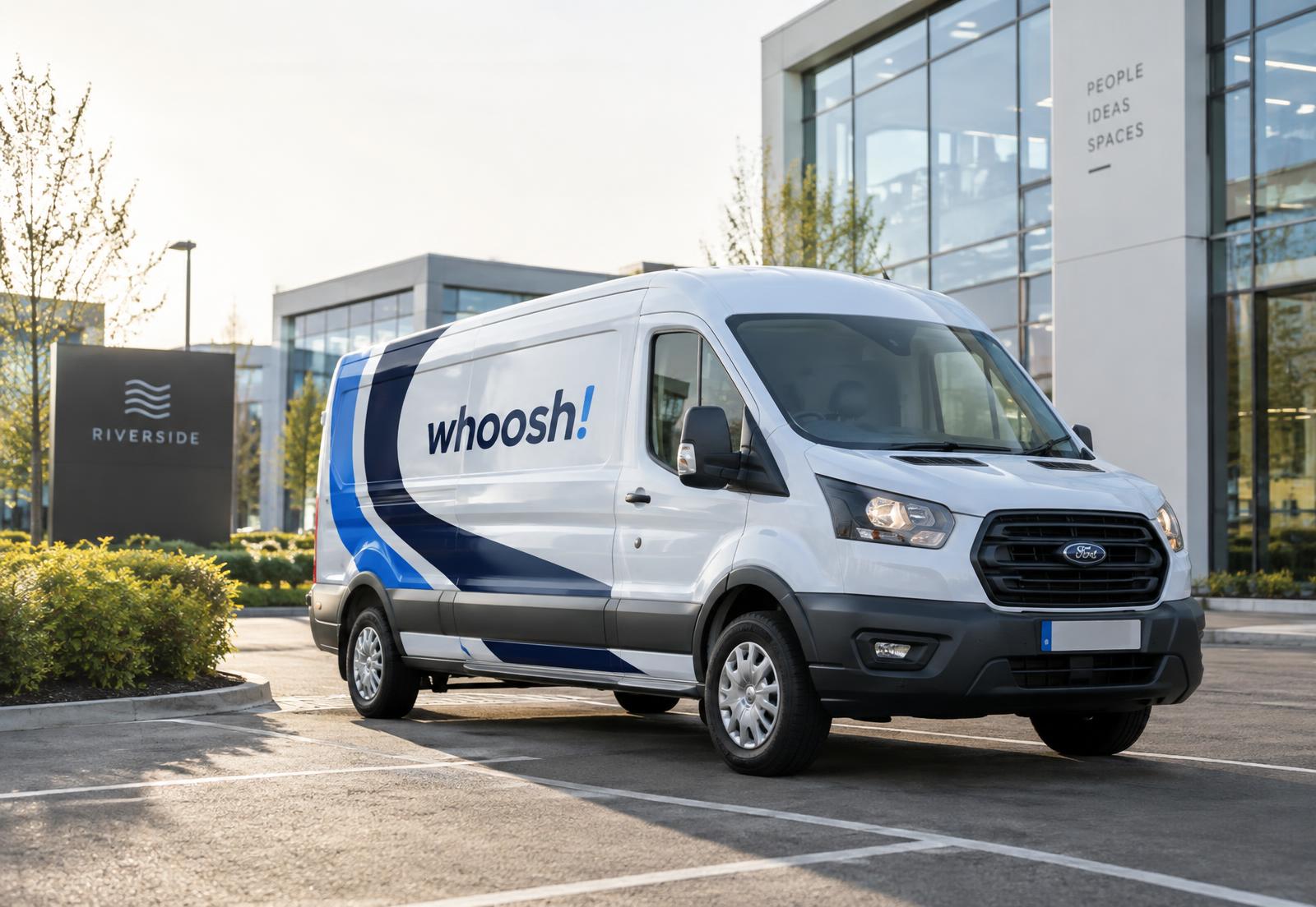 White WHOOSH courier van with navy and blue livery parked at a UK business park